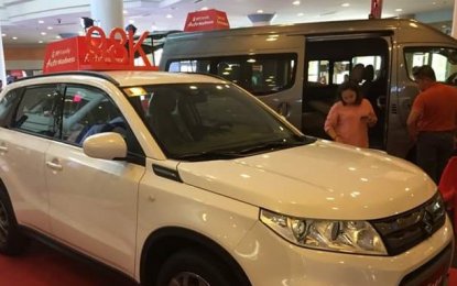 <p><strong>LOANS MADNESS</strong>. Automobile dealers in Bacolod City display their car models at the BPI Family Savings Bank Loans Madness event in Robinsons Place Bacolod on Friday (March 23, 2018).<em> (Photo courtesy of  Suzuki AutoBacolod Sales)</em></p>
